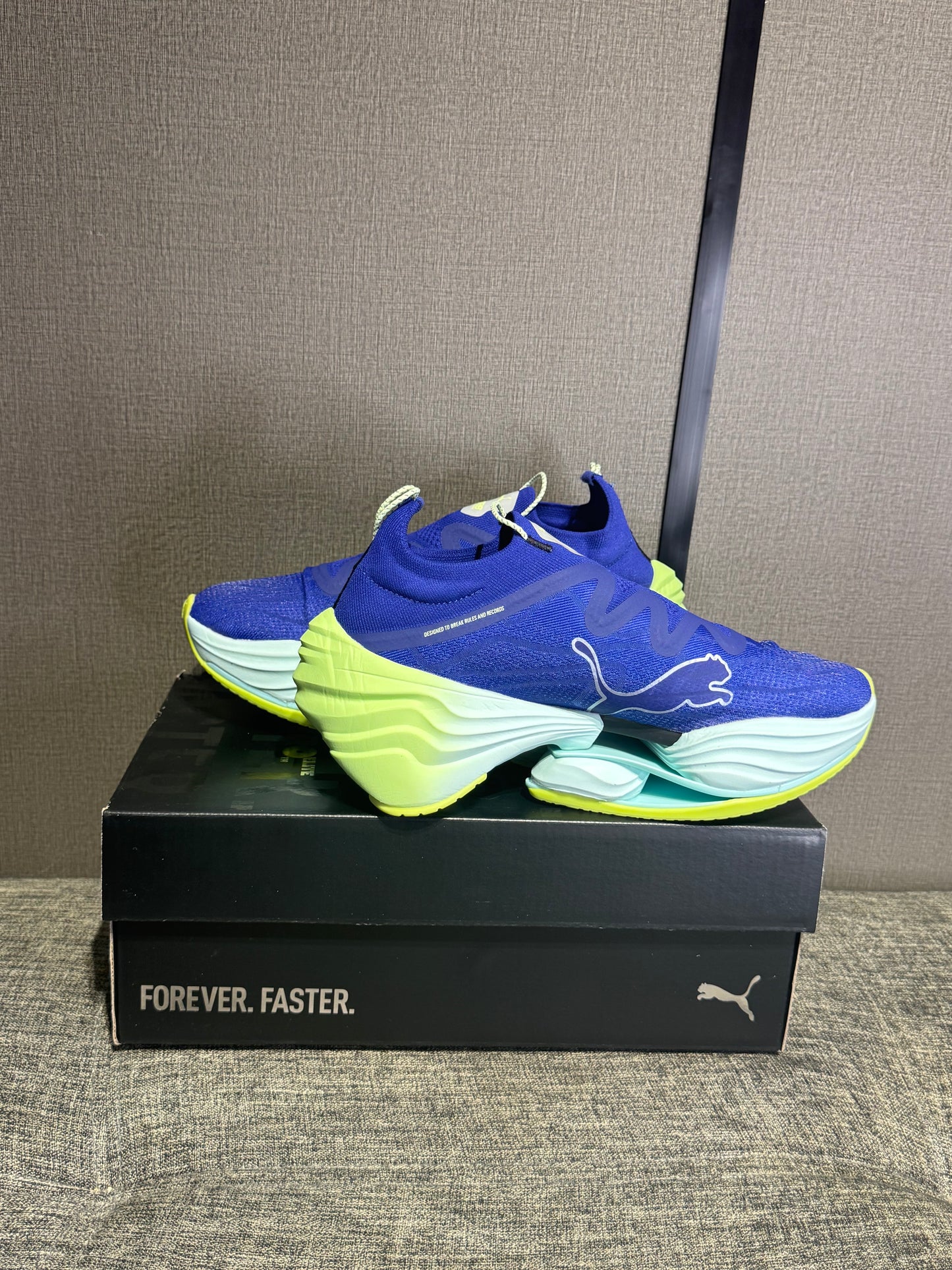 Puma Fast RB Nitro Elite running shoes in a blue and lime