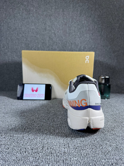 On Cloud surfer Next running shoes in the white/flame