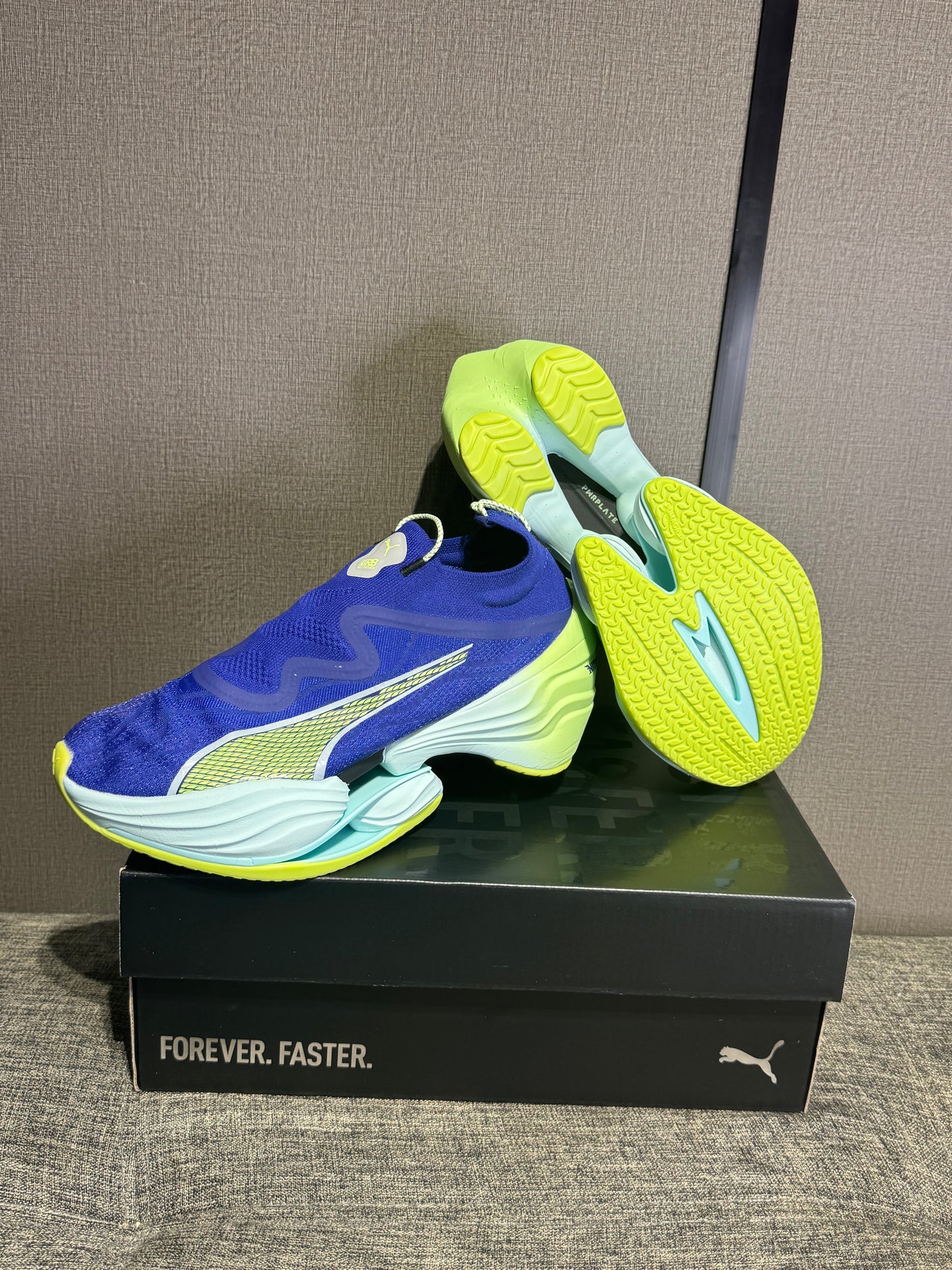 Puma Fast RB Nitro Elite running shoes in a blue and lime