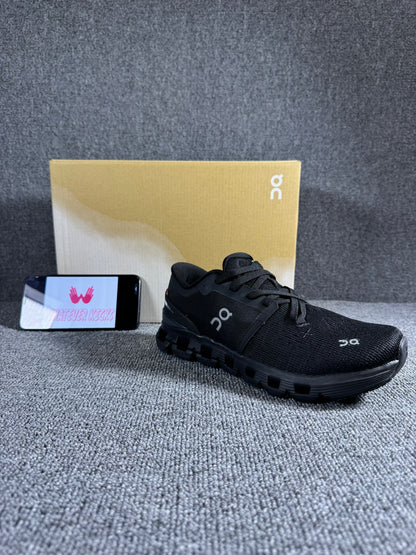 On Cloud X 4 running shoe in the black and eclipse