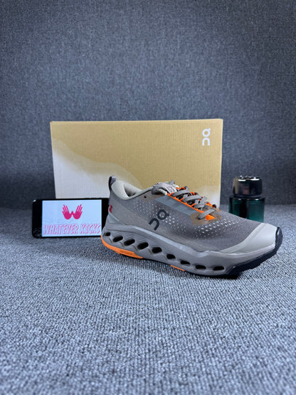 On Cloud surfer Trail 2 running shoe in the Eclipse/Cinder