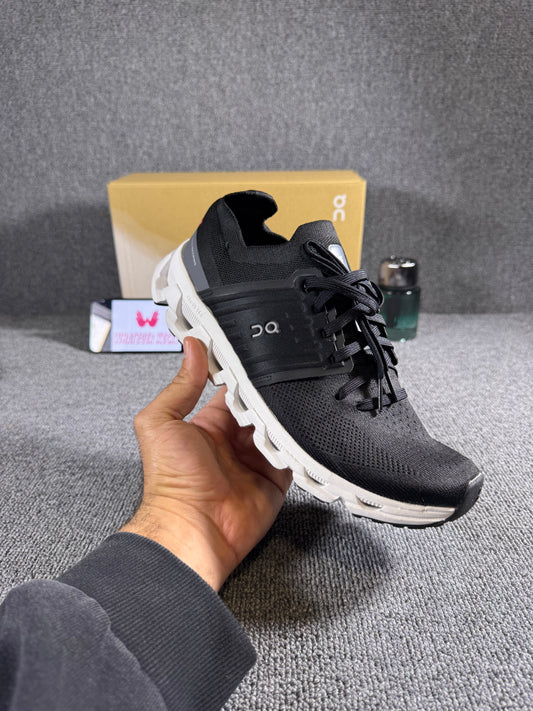 On Cloudswift 3 running shoes in a black and white