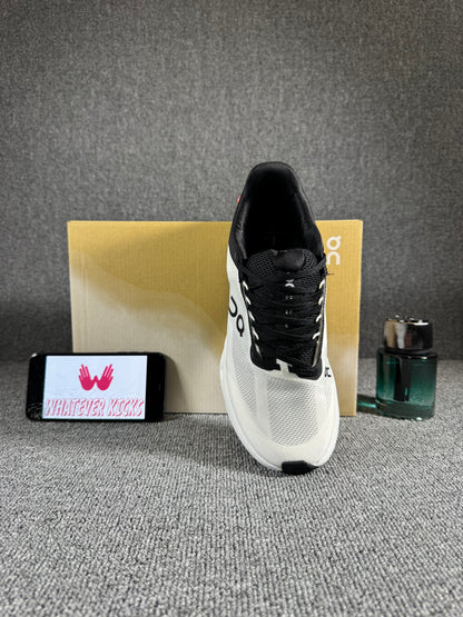 On Cloudsurfer Next running shoes in the Glacier White color.
