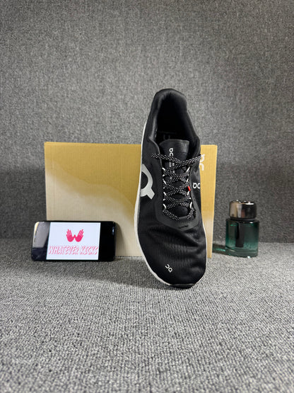 On Cloudmonster 2 running shoes in black and white