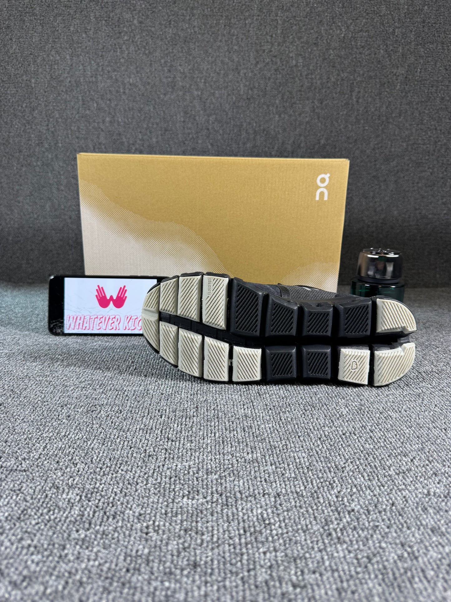 This is a pair of On Cloud X 3 sneakers in black