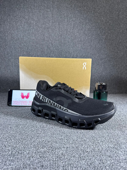 On Cloudmonster 2 running Black shoes