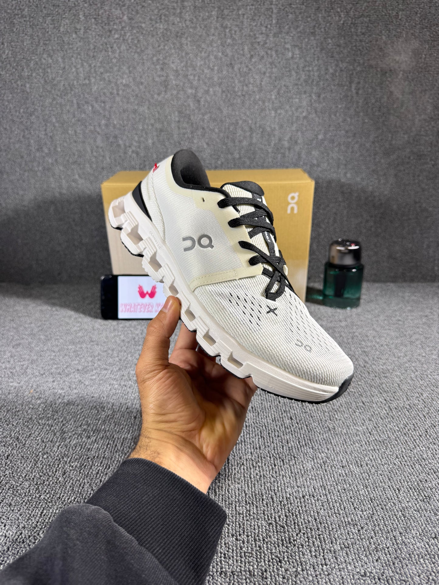 On Cloud X 4 running and training shoes in an ivory/black