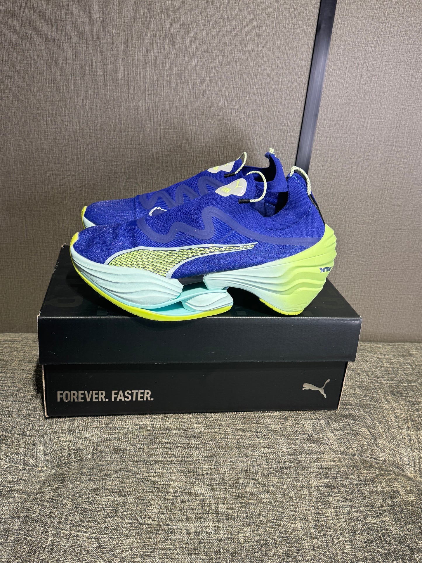 Puma Fast RB Nitro Elite running shoes in a blue and lime