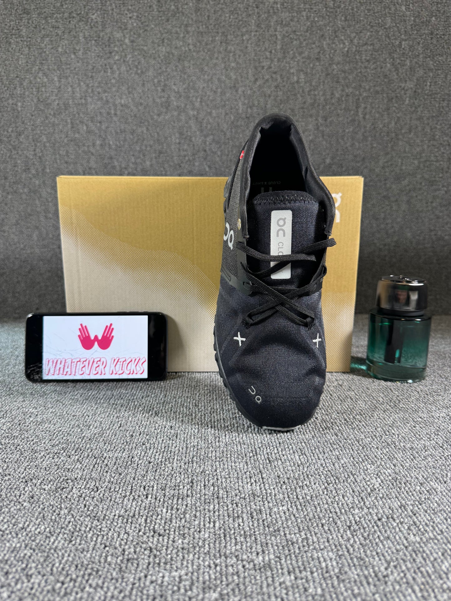 This is a pair of On Cloud X 3 sneakers in black