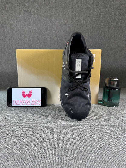 This is a pair of On Cloud X 3 sneakers in black