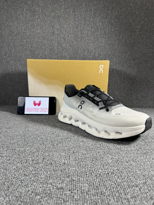 On Cloud tilt sneaker in the gray/rock and ivory