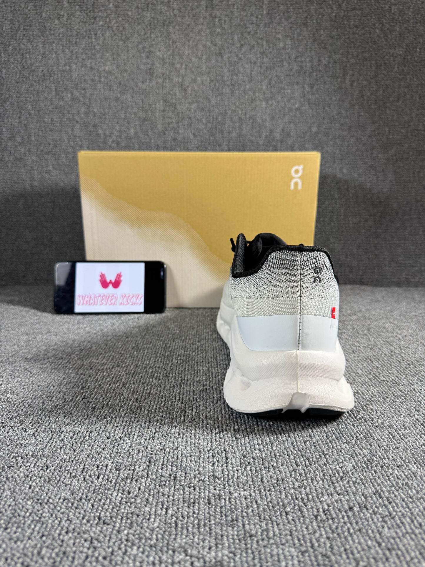 On Cloud tilt sneaker in the gray/rock and ivory