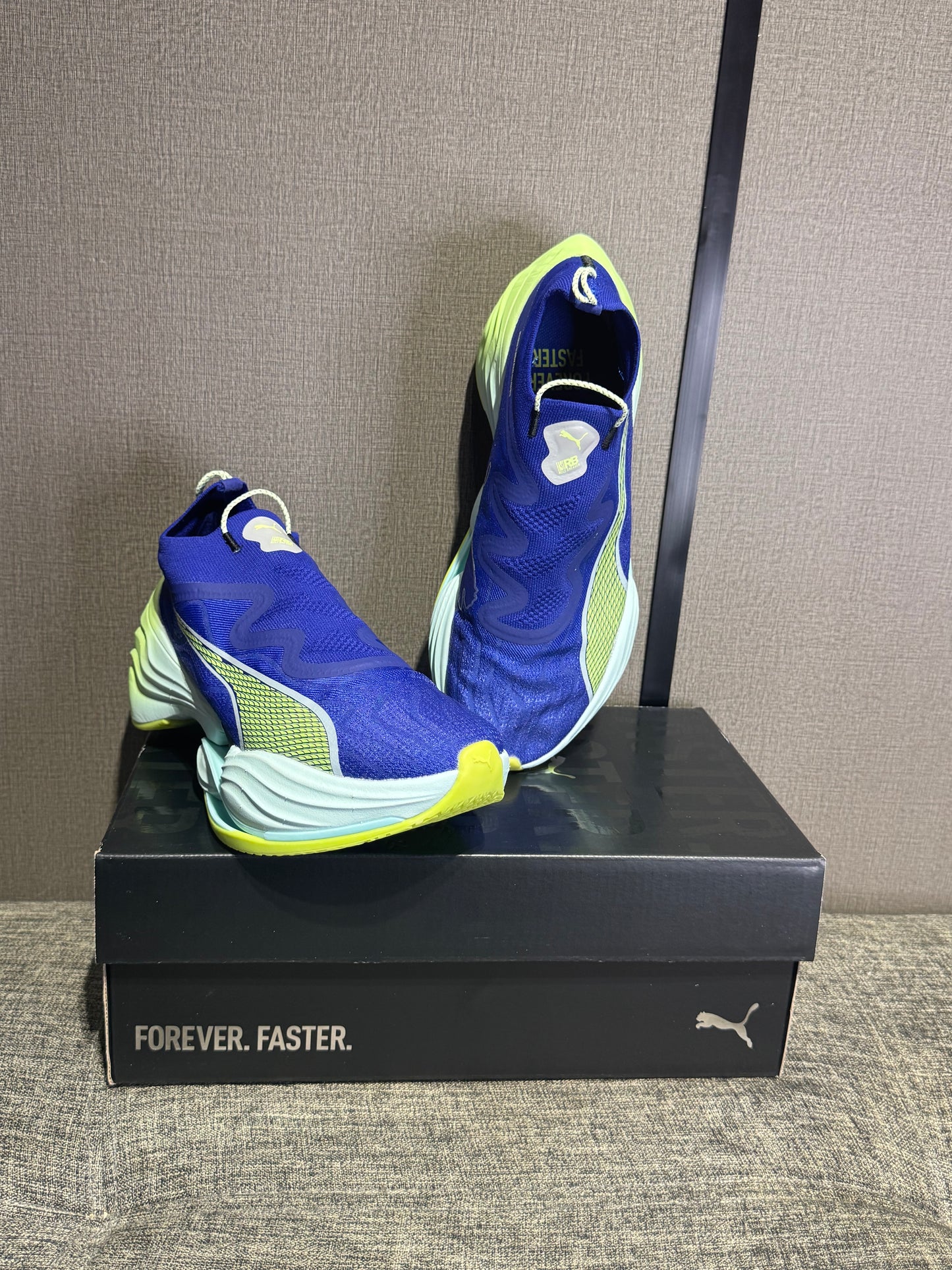 Puma Fast RB Nitro Elite running shoes in a blue and lime