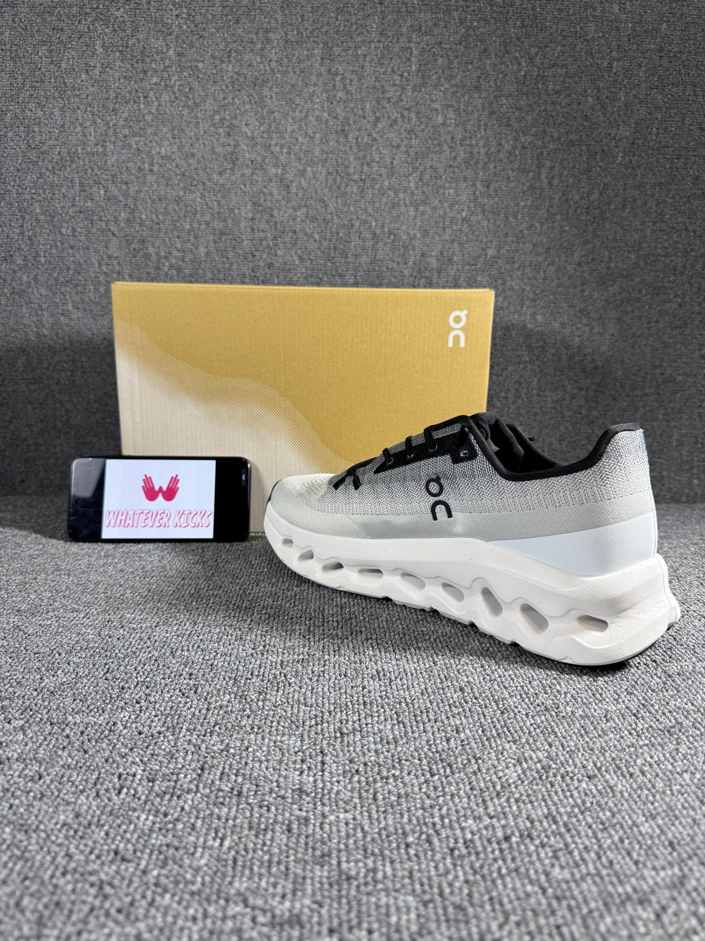 On Cloud tilt sneaker in the gray/rock and ivory