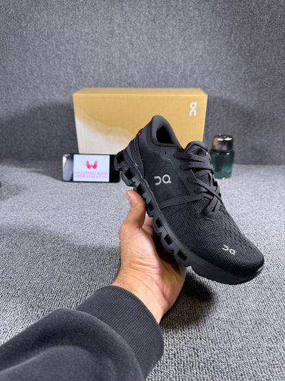 On Cloud X 4 running shoe in the black and eclipse