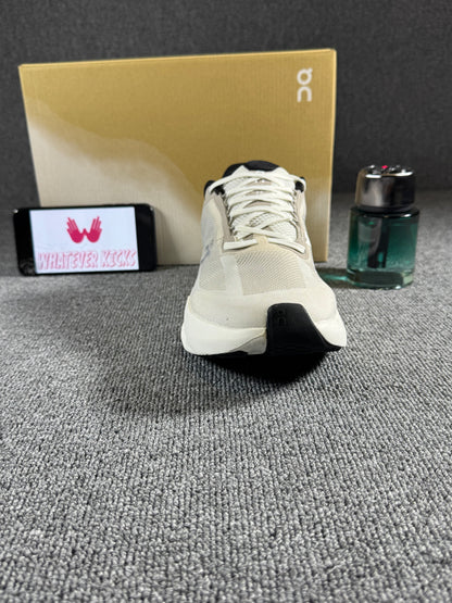 On Cloudsurfer Next running shoes in the Fog/Ivory