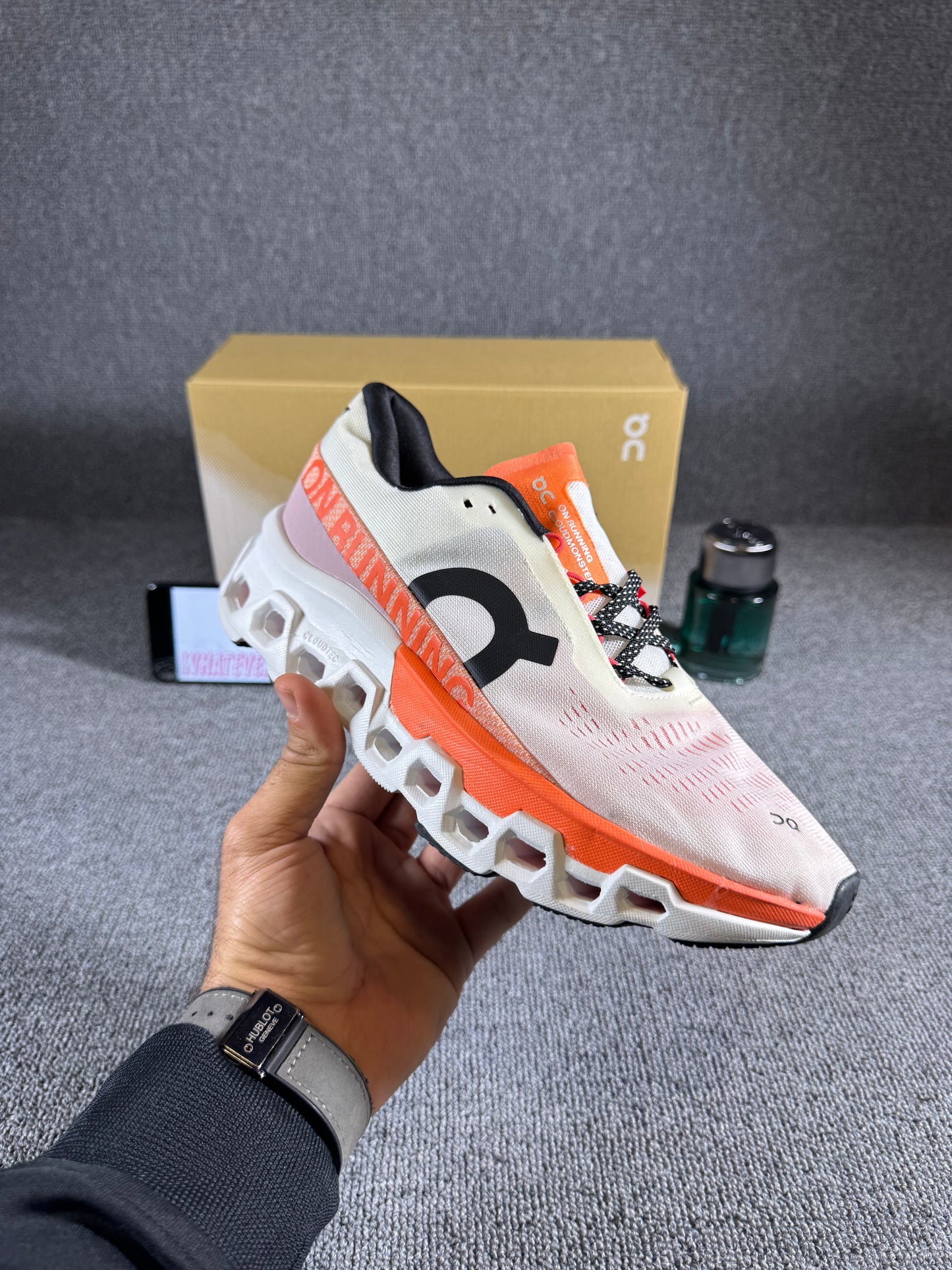 On Cloudmonster 2 running sneaker in the Undyed Flame