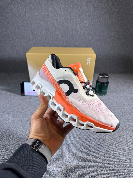 On Cloudmonster 2 running sneaker in the Undyed Flame